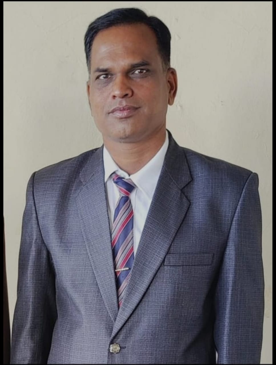 Prof. (Dr.) Purushottam Giri